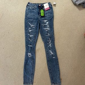 high rise ripped skinny jeans